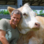 Gene and Cow Living the Farm Sanctuary Life